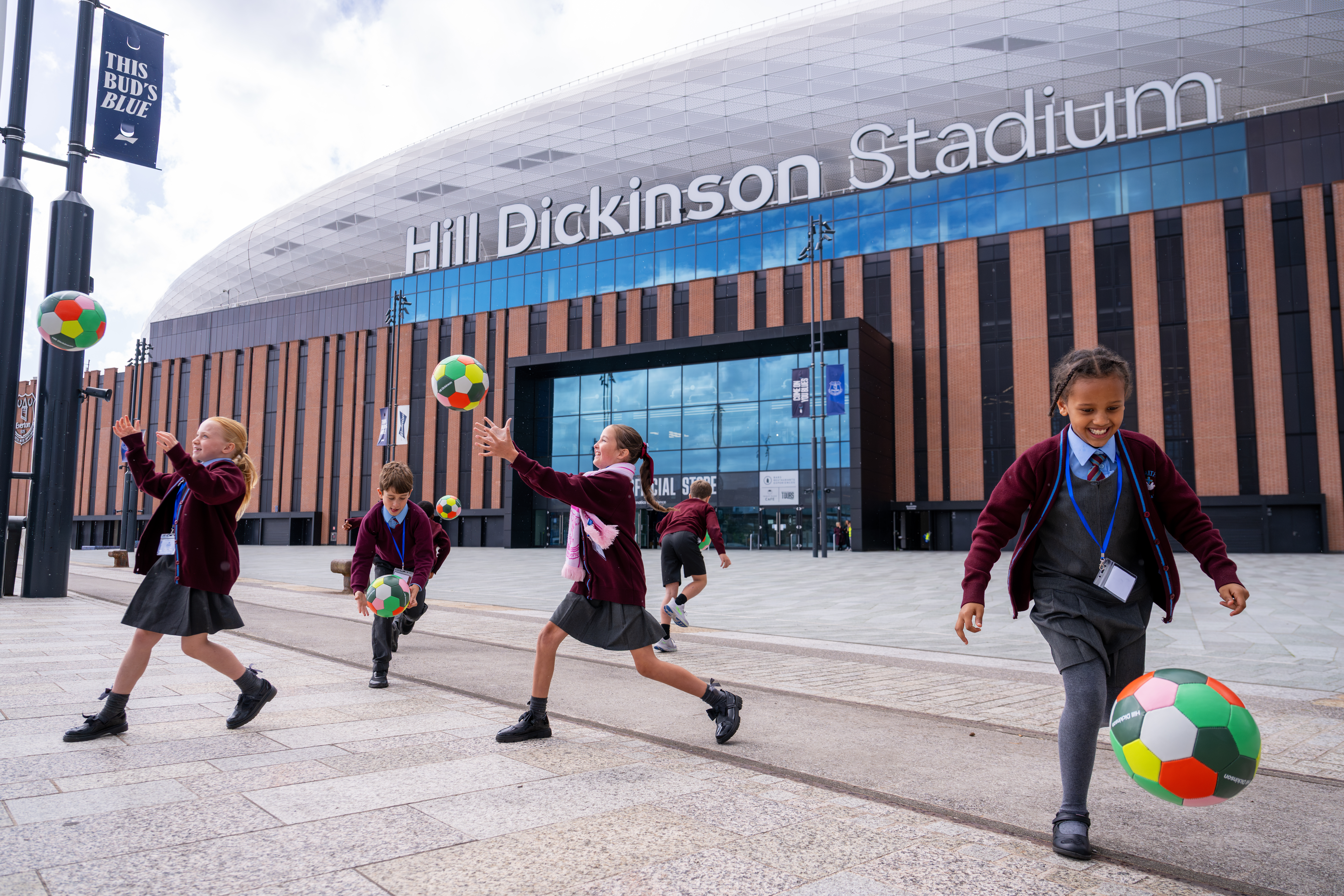 Children playing outside Hill Dickinson Stadium